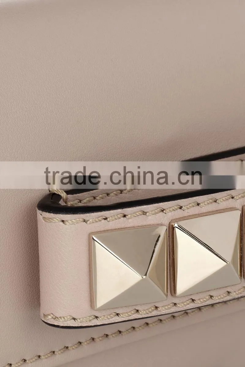 S034 Latest first class PU clutch Bags with Pyramid Studs Shoulder strap Handbags Factory
