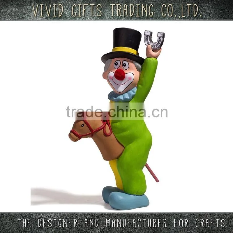 Ceramic clown ridding a horse in patry decoration