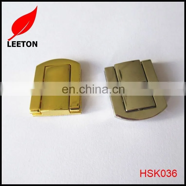 Shiny gold metal lock for wooden box