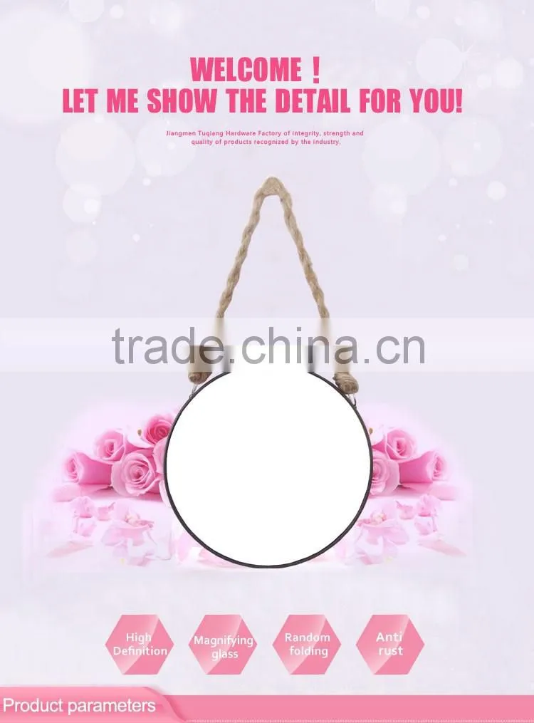 Round metal framed hanging makeup mirror