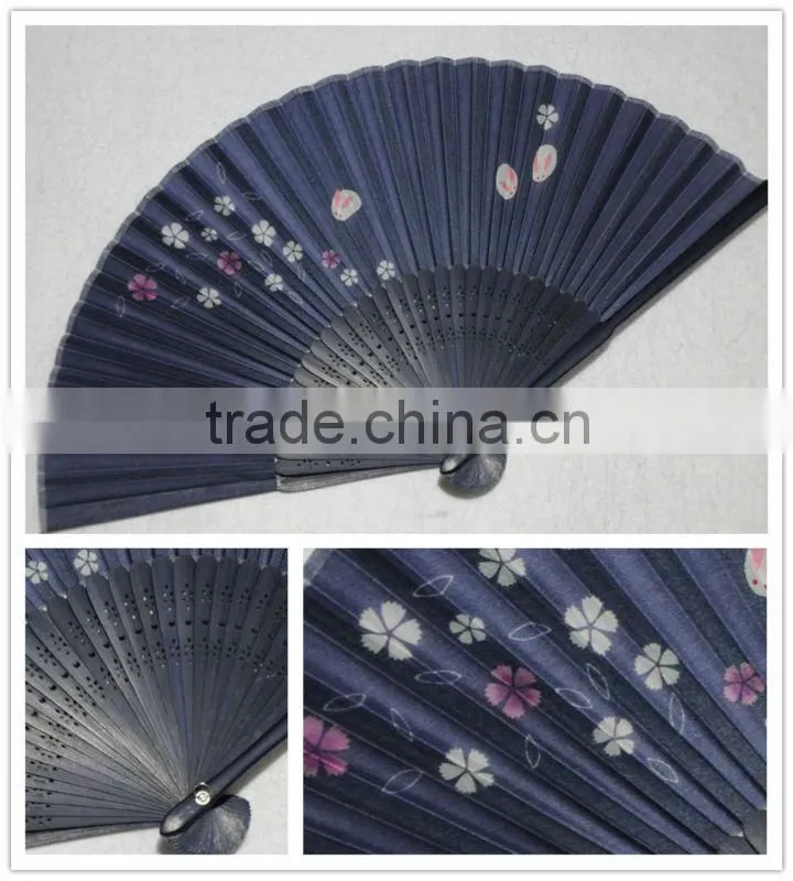 Japanese style bamboo folding fan with black ribs