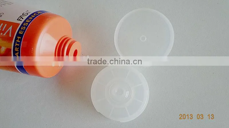 plastic tube for cosmetic with orange color,flexible labeling PE tube,empty tube ,soft tube