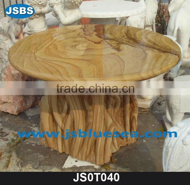 Stone carving of table and bench