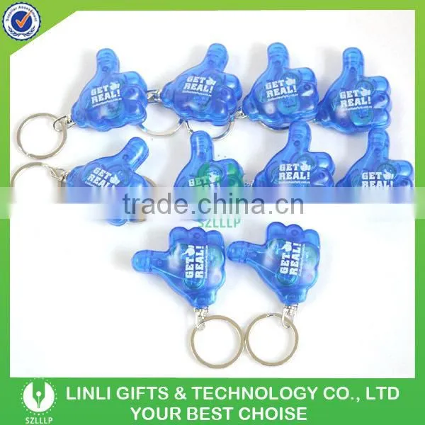 Thumb shape oem logo plastic led keyring light for advertising