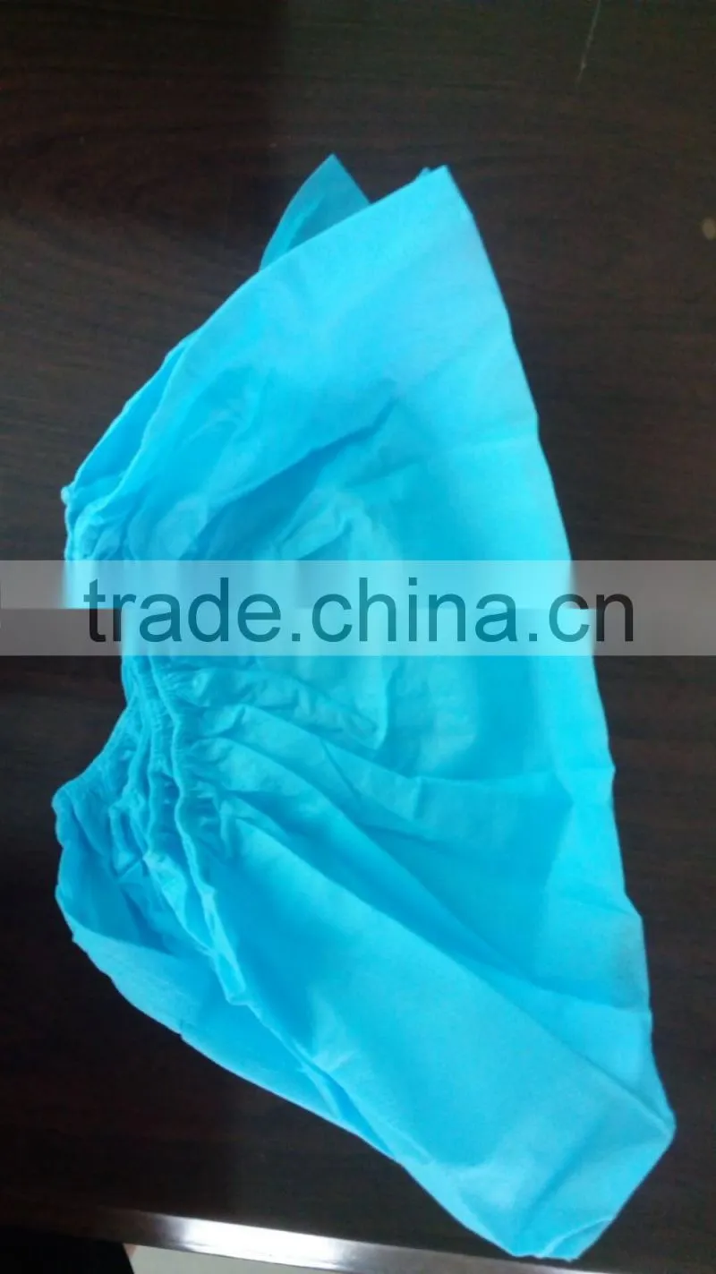 Disposable nonwoven shoe cover
