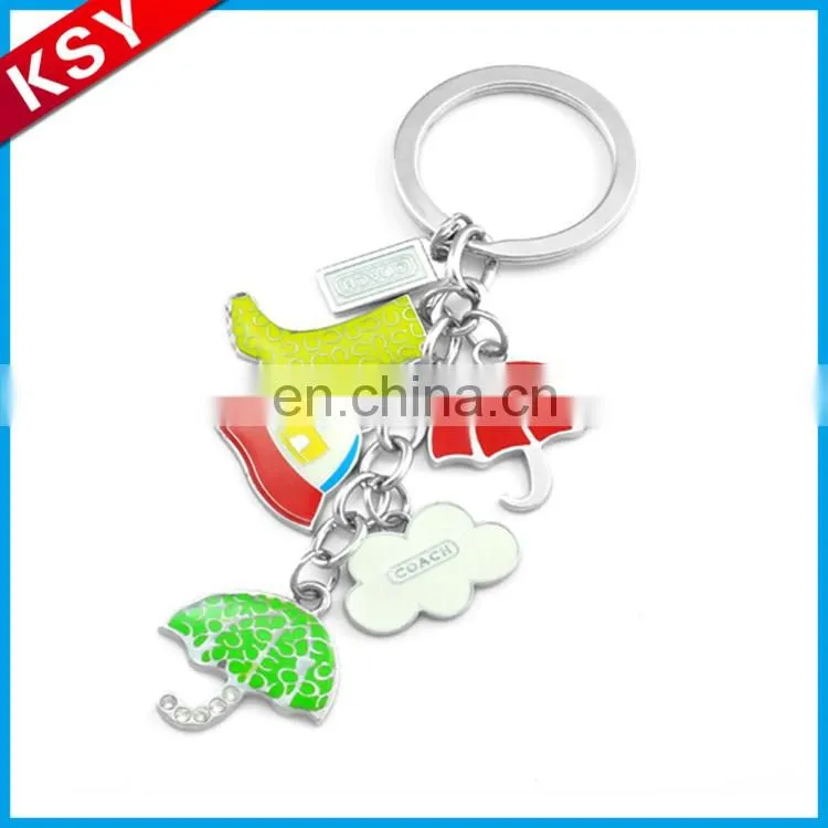 polished nickel key shape keychain