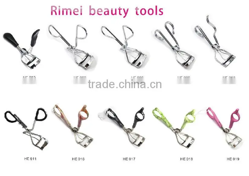 Silver colour tweezers and stainless steel eyelash curler
