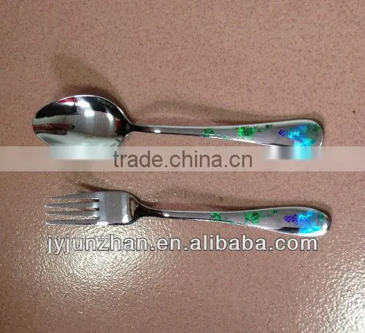 Stainless dinner fork with mirror polish and colorful laser logo
