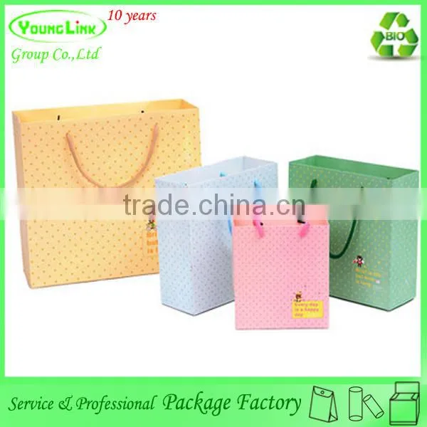 Lovely gift carrier paper bag/custom made shopping bags/paper bags with handles