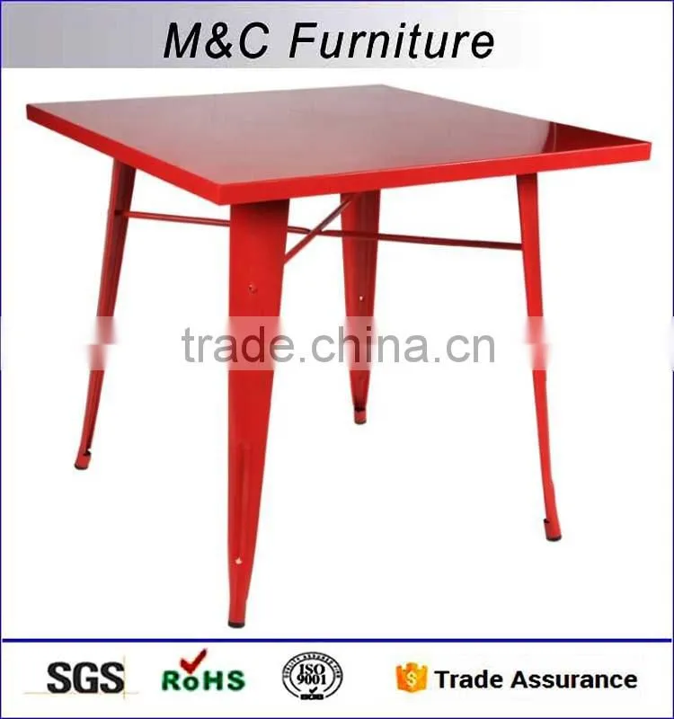 Small red square folding metal table with four legs
