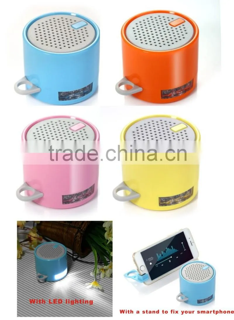 Popular portable mini bluetooth speaker with phone stand and LED torch lighting
