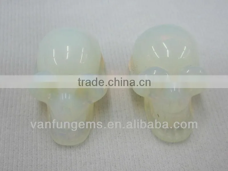 Different size color White Opal gemstone skull
