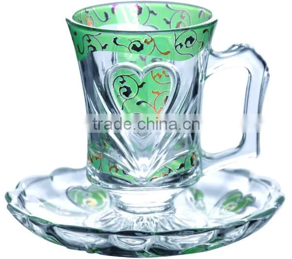 Glass coffee cups and saucers