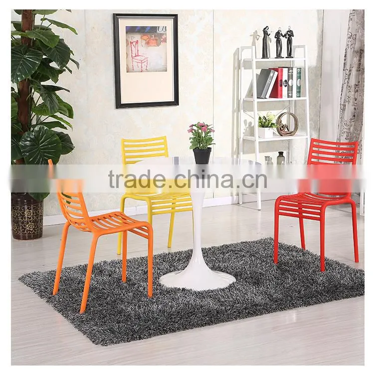 Simple stackable red plastic chair