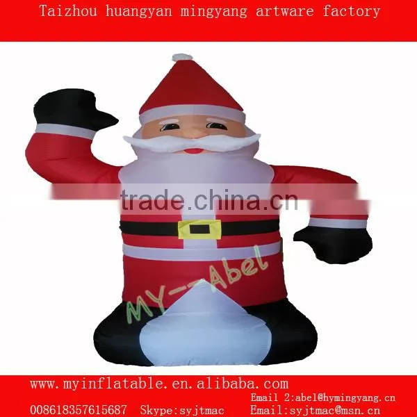 Christmas decorations santa and penguin by train