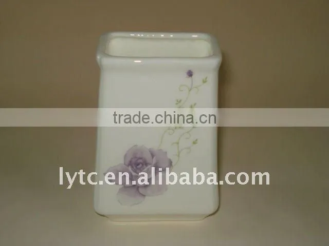 ceramic napkin holder with flower design