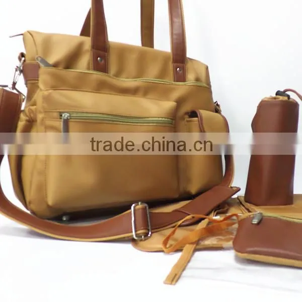 leather bady diaper bag designer