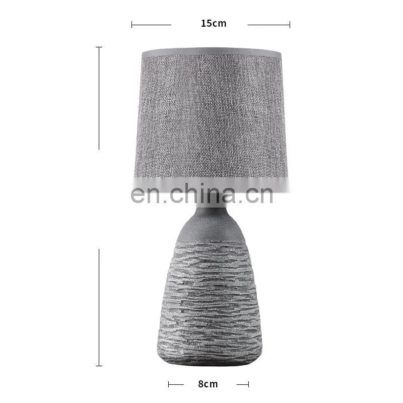 antique ceramic meterial beside table lamp