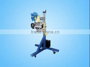Automatic assembly line labeling head