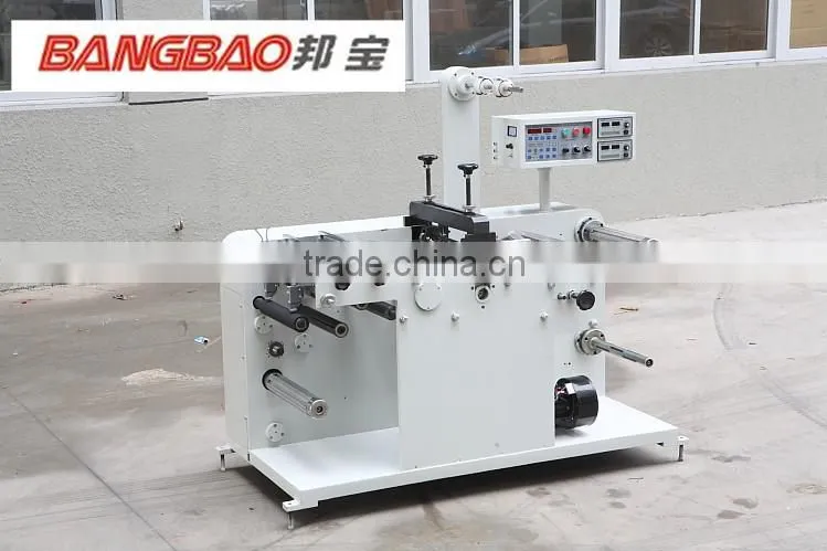 tape slitting machine with circular pressure for dacron label