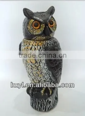 cute smart garden owl with plastic bobbling head activated moving by wind action