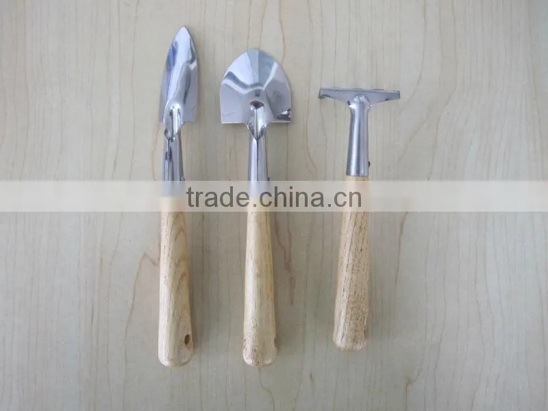 iron tool with wooden handle garden tool wooden rake wooden shovel wooden spade