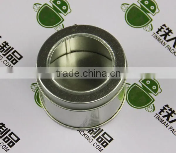 Round tin can with clear window