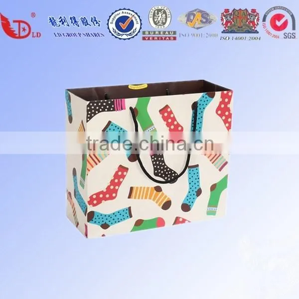 special design cost production paper packing bag low price