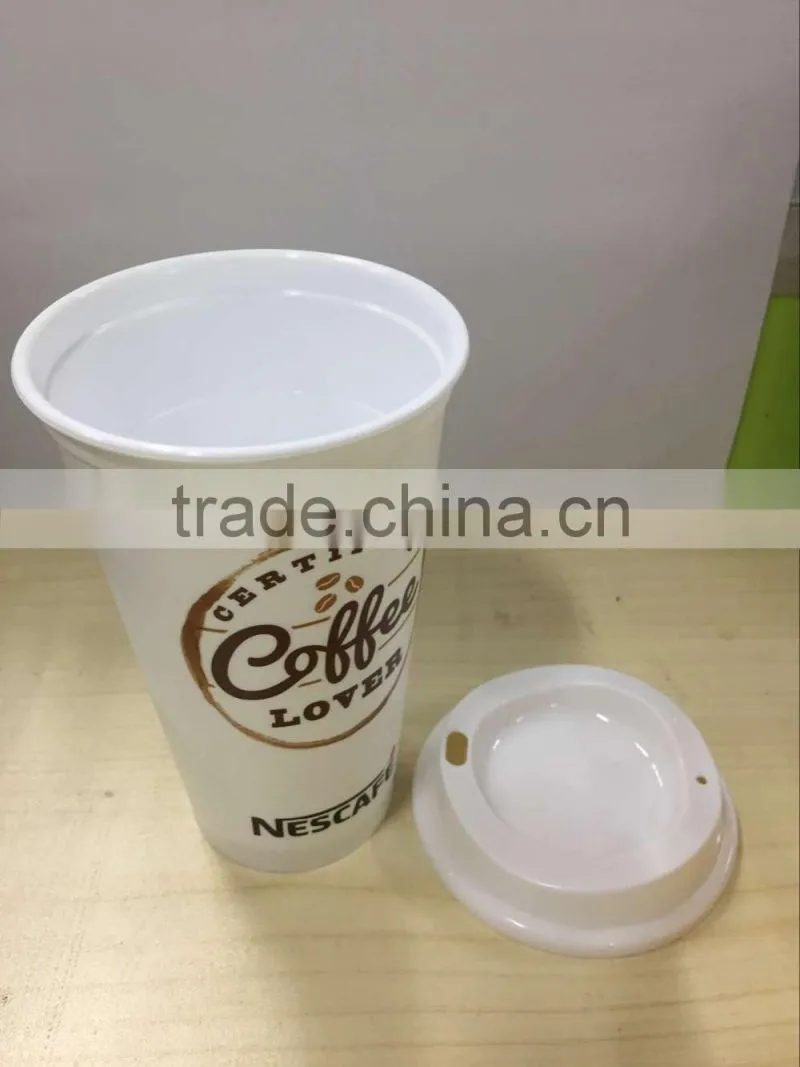 Hot and cold Plastic travel coffee cup with lid and silicone band