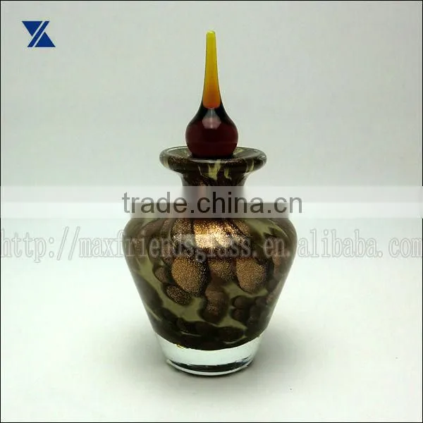 black with golden dot glass perfume