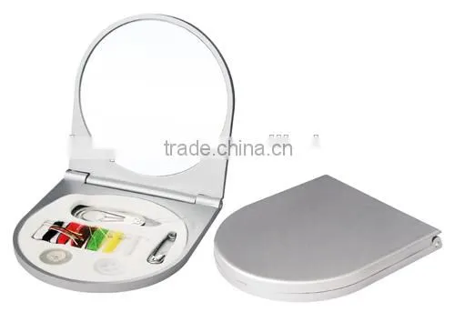 pocket mirror with sewing kit