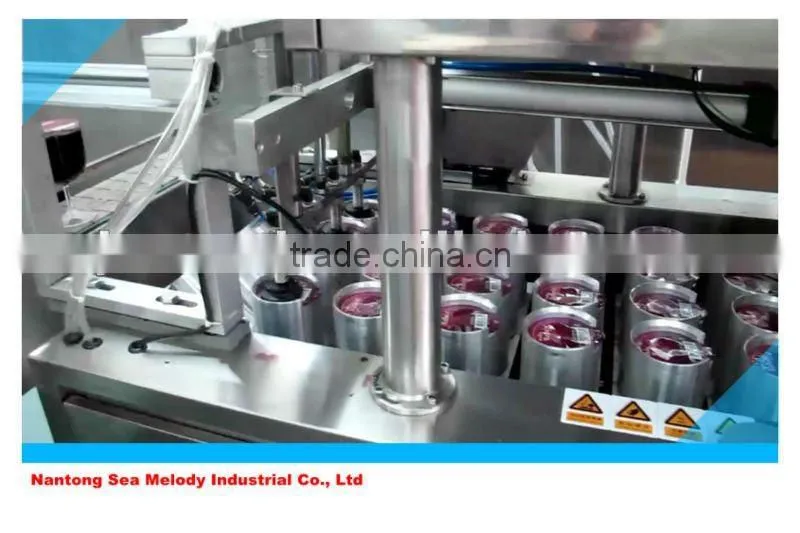 Curd cup sealing machine