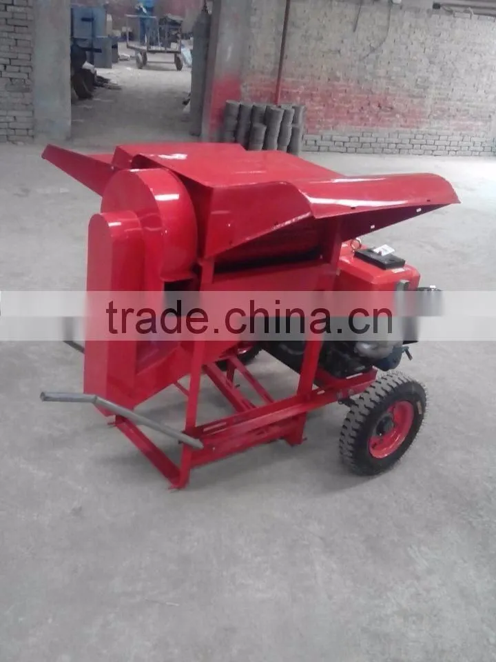 Movable mini paddy grain thresher