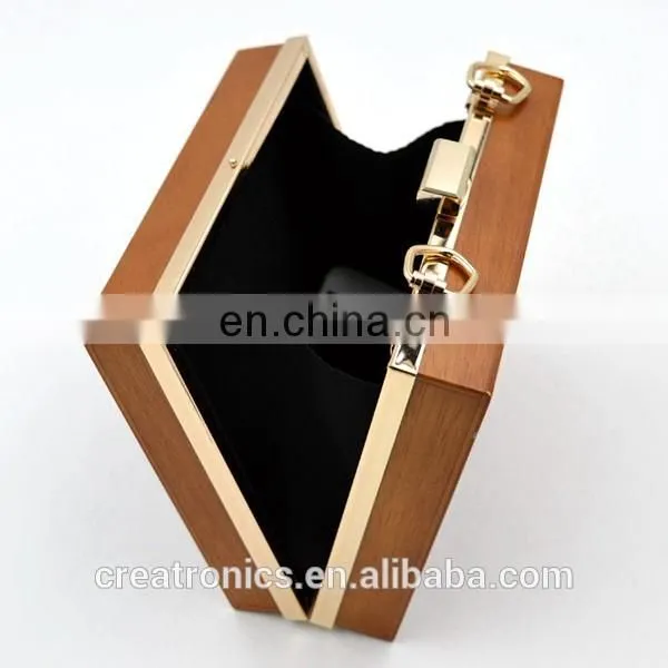 CR Factory OEM acceptable engraving patterns hollowed-out design metal frame long chain rectangled shaped wooden box clutch bag