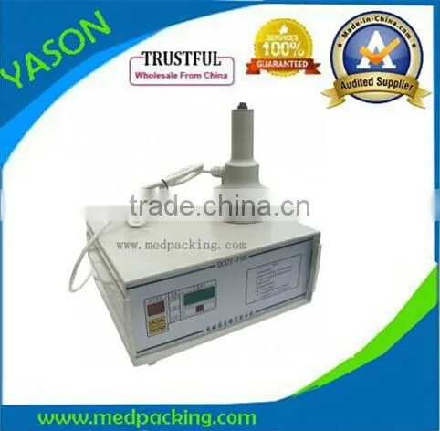 Good quality manual inductor aluminum foil sealing machine