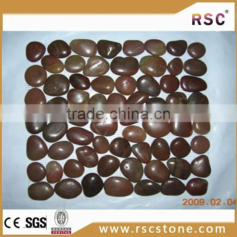 Red glow in the dark perfect pebble stone