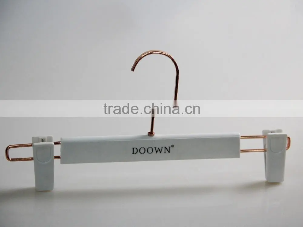 white plastic clothes hanger suit hanger