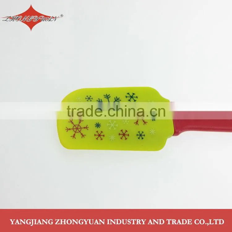 Flexible middle size snowflake printing silicone scraper with plastic handle, best selling