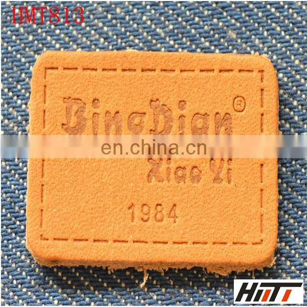 custom embossed leather label
