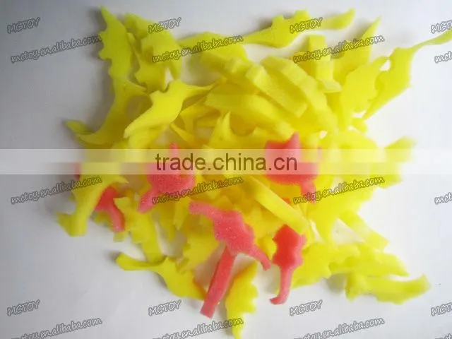 A variety of colors Factory supplier Growing dinosaur capsule Christmas joke funny toys 12pcs/blister card 0.7*2.3cm