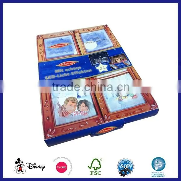 Cardboard stamped little doors advent calendar with plastic inlay for toys