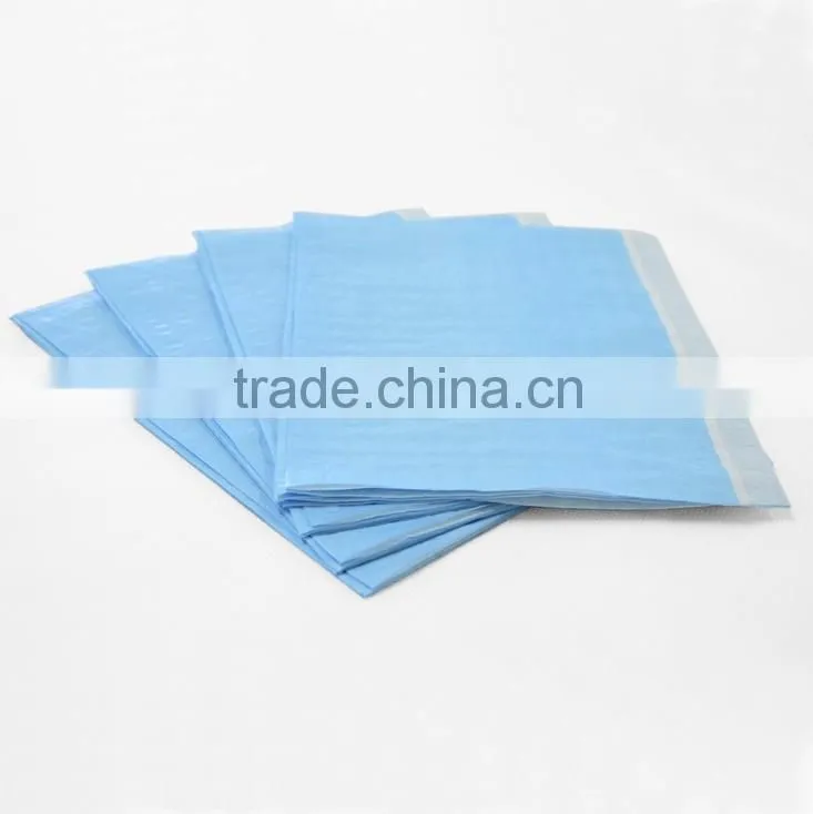 Disposable surgical examination drape