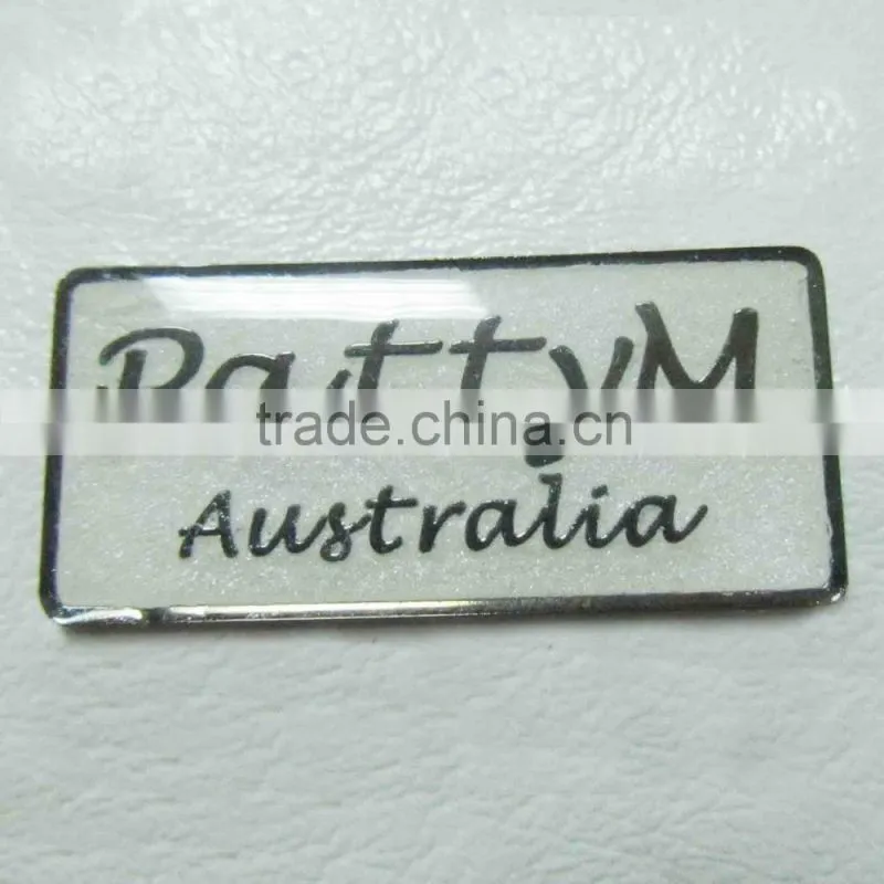 customized metal label with embossed letters
