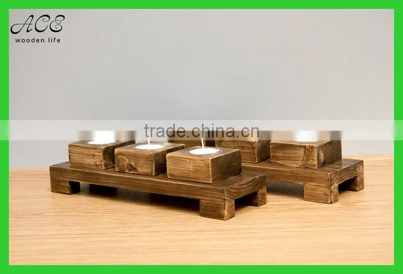 Antique wood candle holder