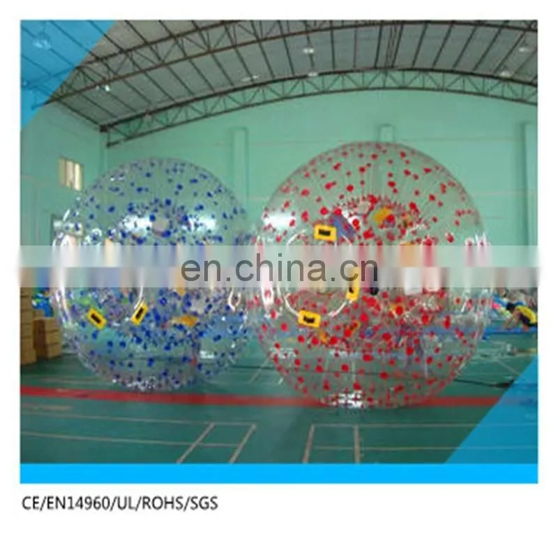 colorful inflatable climb in ball. inflatable zorb ball on soccer grass filed