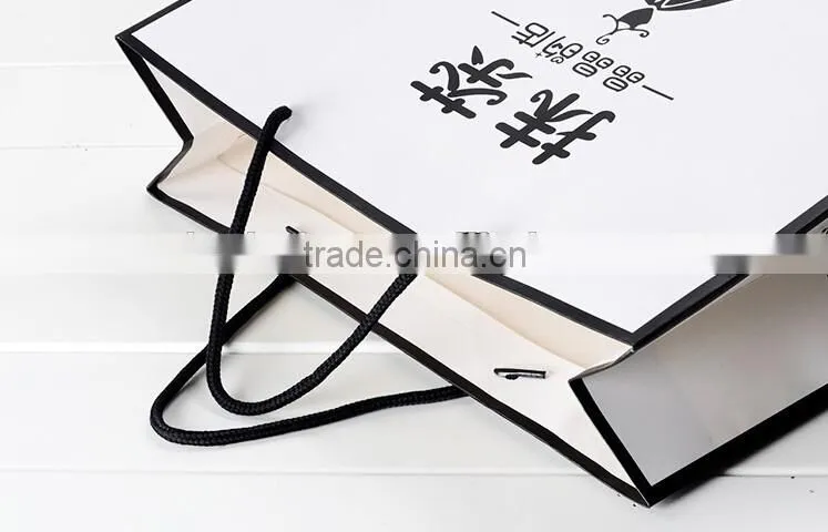 Ivory board paper bag ,shopping bags,promotion bag ,rope handle , customized printing is welcome