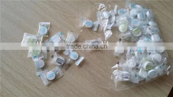 10pcs/tube packing 100% mesh spunlace white nonwoven fabric towels compressed to round shape coin mini magic