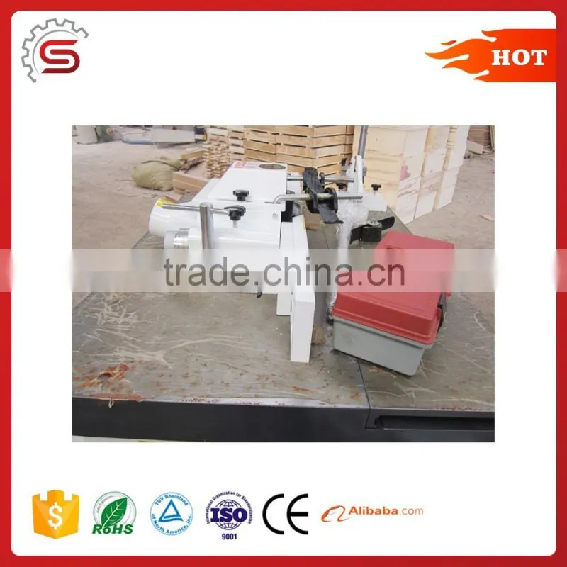 Woodworking spindle moulder with tilt spindle