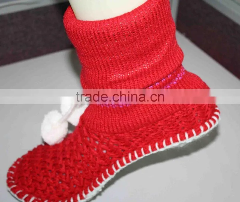 Thick knitted woman socks with pompoms