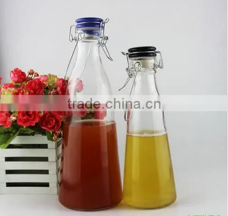 Wholesale beverage glass bottles glass juicer bottle with swing top lids